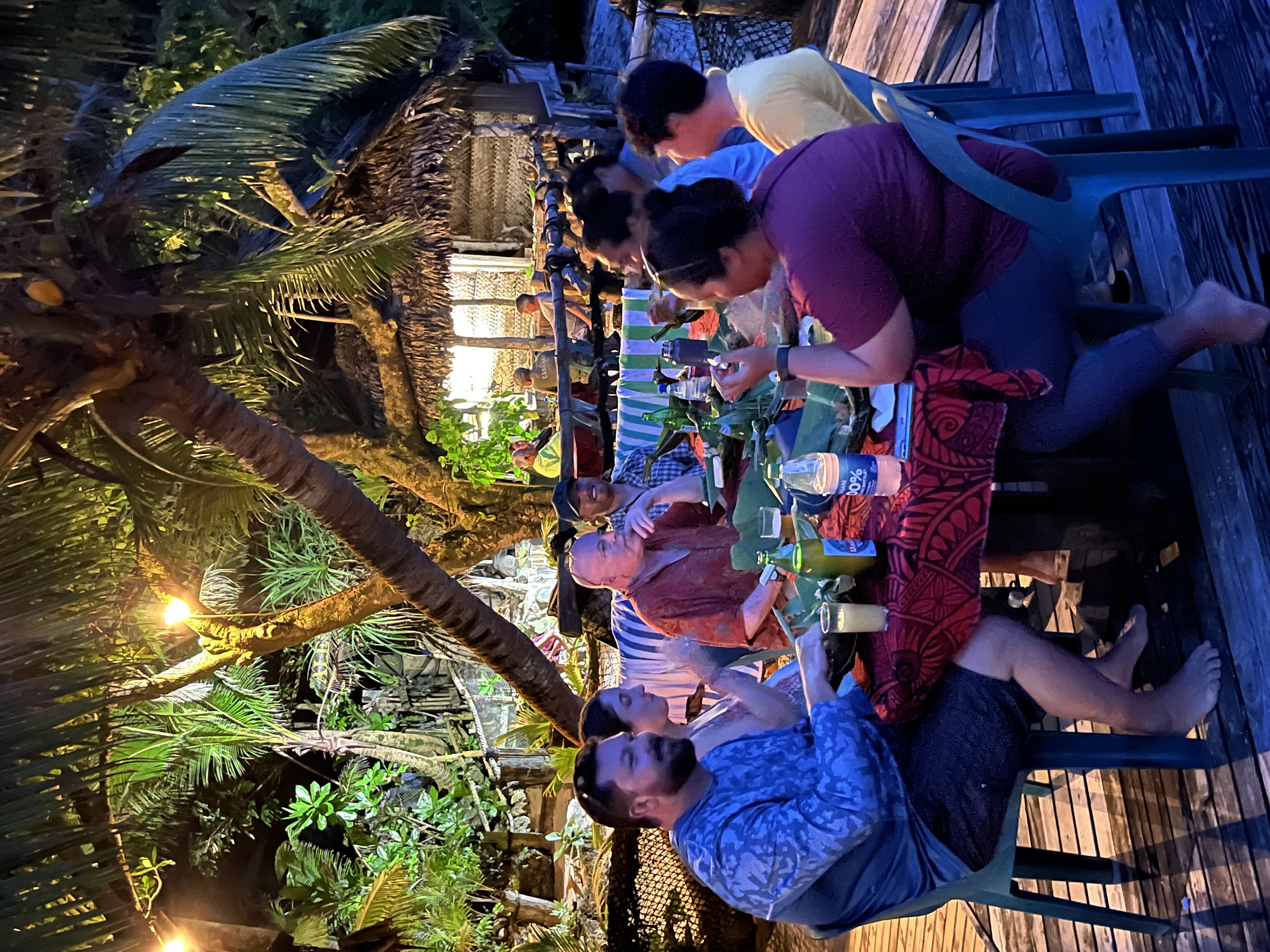 Community gathering and dining together at traditional fale