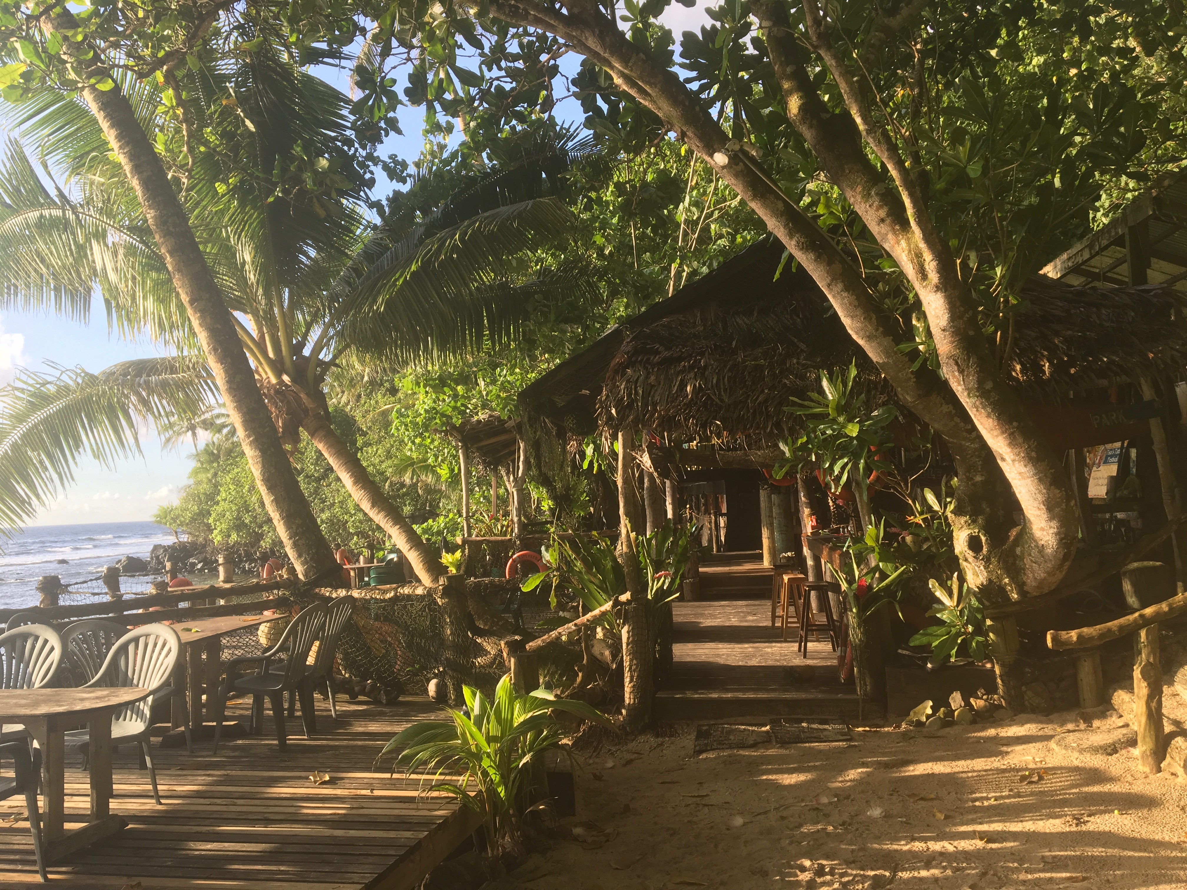 Traditional outdoor cooking area at Alega with fale structure
