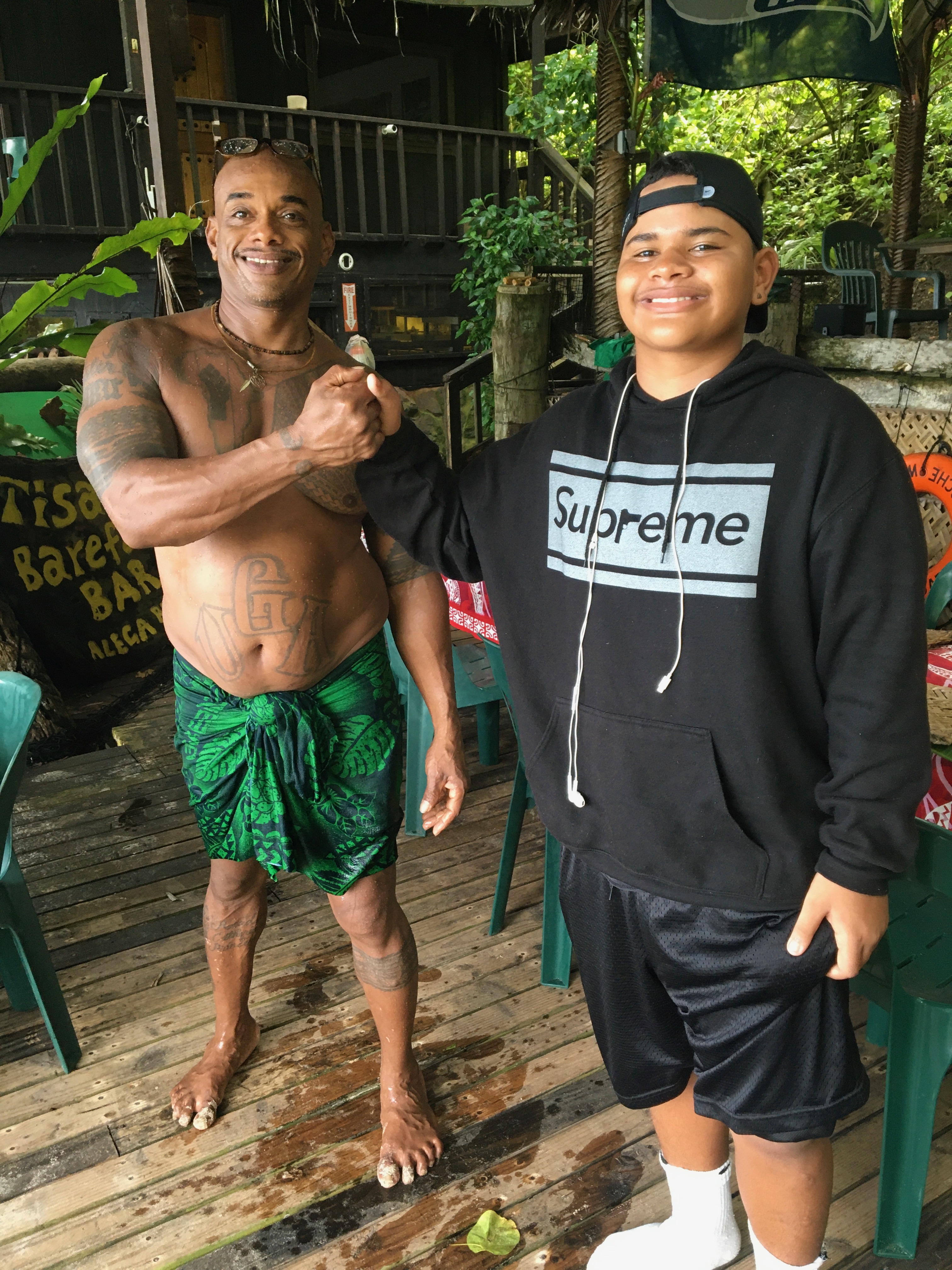 Samoan man displaying traditional pe'a tattoo with full body traditional tattoo work